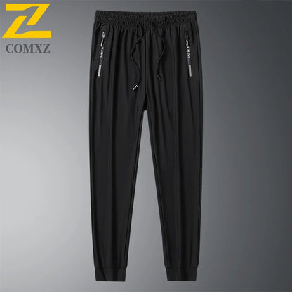 2025 Summer Men's Thin Ice Silk Casual Pants Loose Fit Plus Size Quick-Dry Elastic Joggers 9/4 Length Tapered Ankle Sweatpants