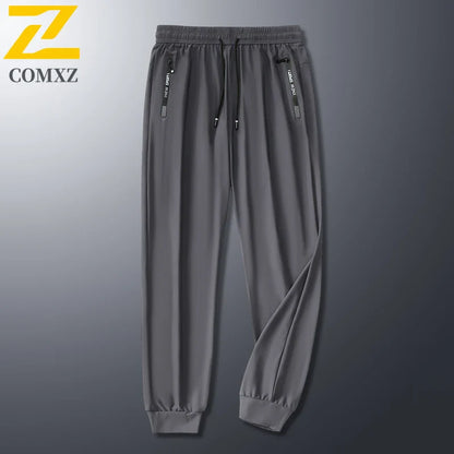 2025 Summer Men's Thin Ice Silk Casual Pants Loose Fit Plus Size Quick-Dry Elastic Joggers 9/4 Length Tapered Ankle Sweatpants
